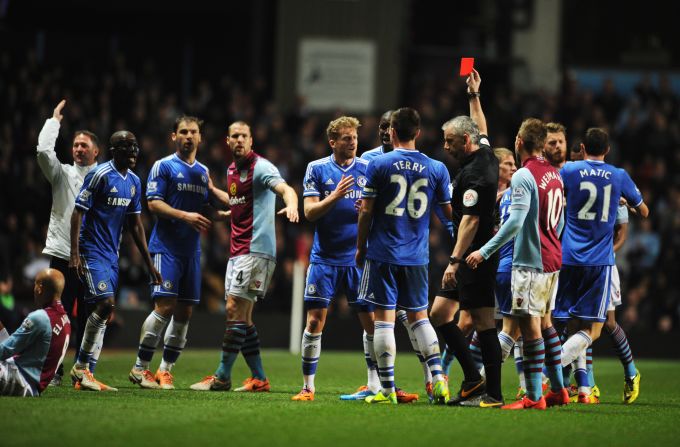 Chelsea midfielder Ramires was sent off for a nasty tackle on Aston Villa's Karim El Ahmadi, sparking angry scenes at the English Premier League match.