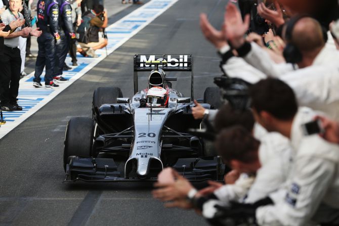 Kevin Magnussen receives the plaudits of his McLaren team after a stunning drive to finish on the podium on his F1 debut.