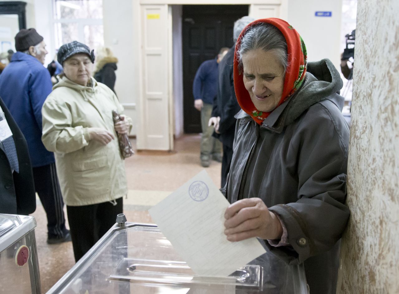 A woman casts her ballot in the Crimean referendum in Simferopol.