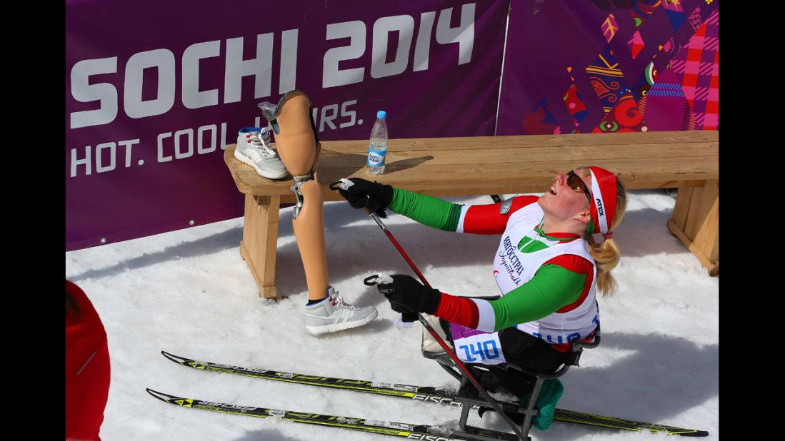 Valiantsina Shyts of Belarus reacts after crossing the finish line in the women's cross-country 5-kilometer sitting event on March 16.