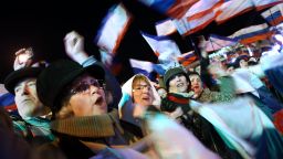 People in Lenin Square attend a pro Russian rally after a day of voting on March 16, 2014 in Simferopol, Ukraine.