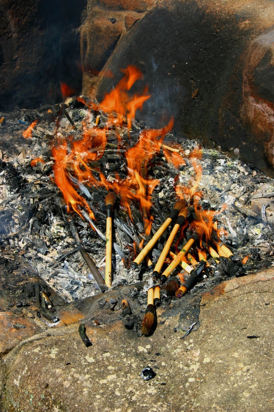 Every year, used brushes from all over Japan are brought to Kumano to be thrown onto a pyre. 