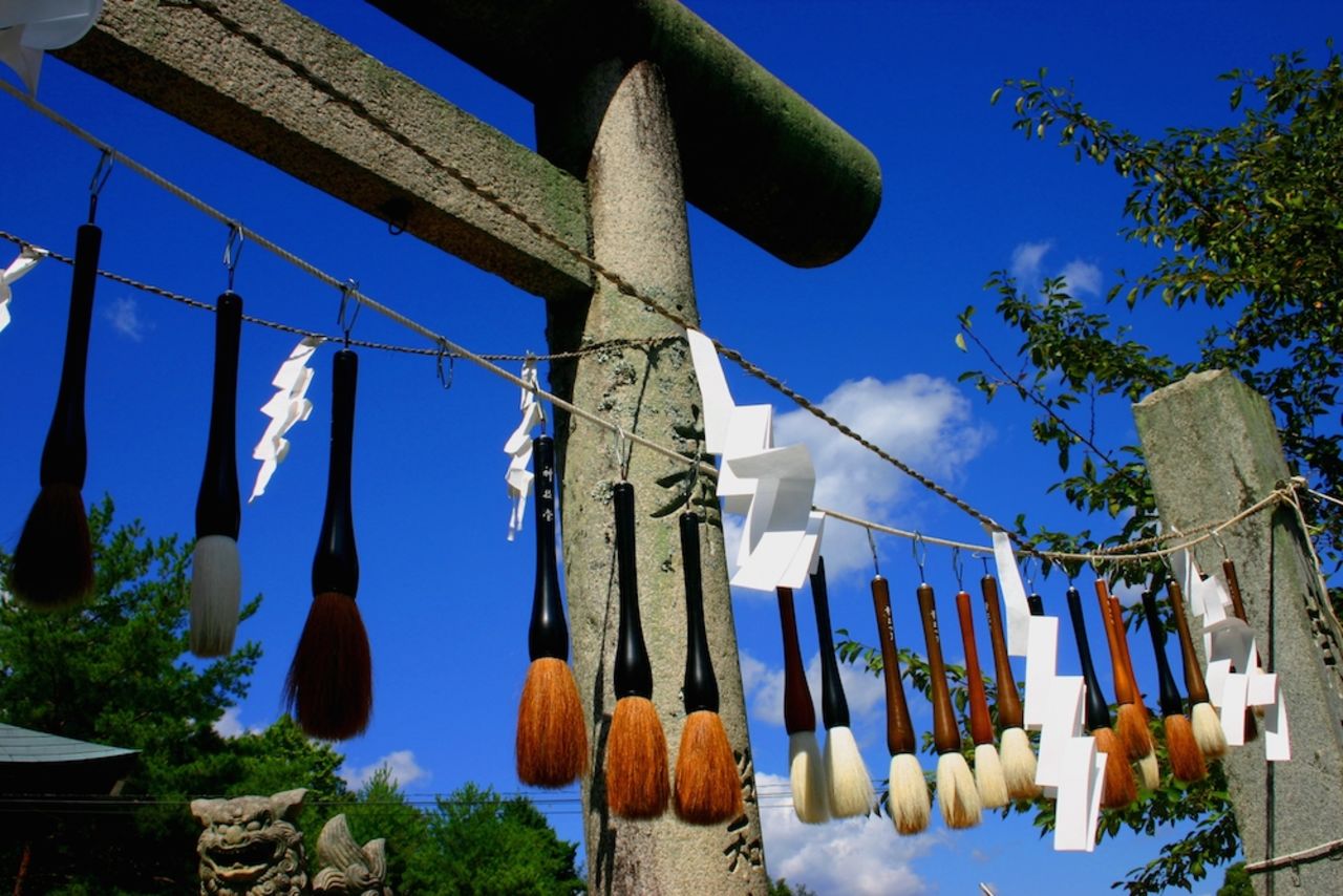 As part of Kumano, Japan's annual Brush Festival, a row of 10,000 brushes hangs along the 99-step path leading to the 10th-century Sakakiyama Shrine. Kumano has been renowned for its brush-making artisans since the end of Japan's Edo period. 