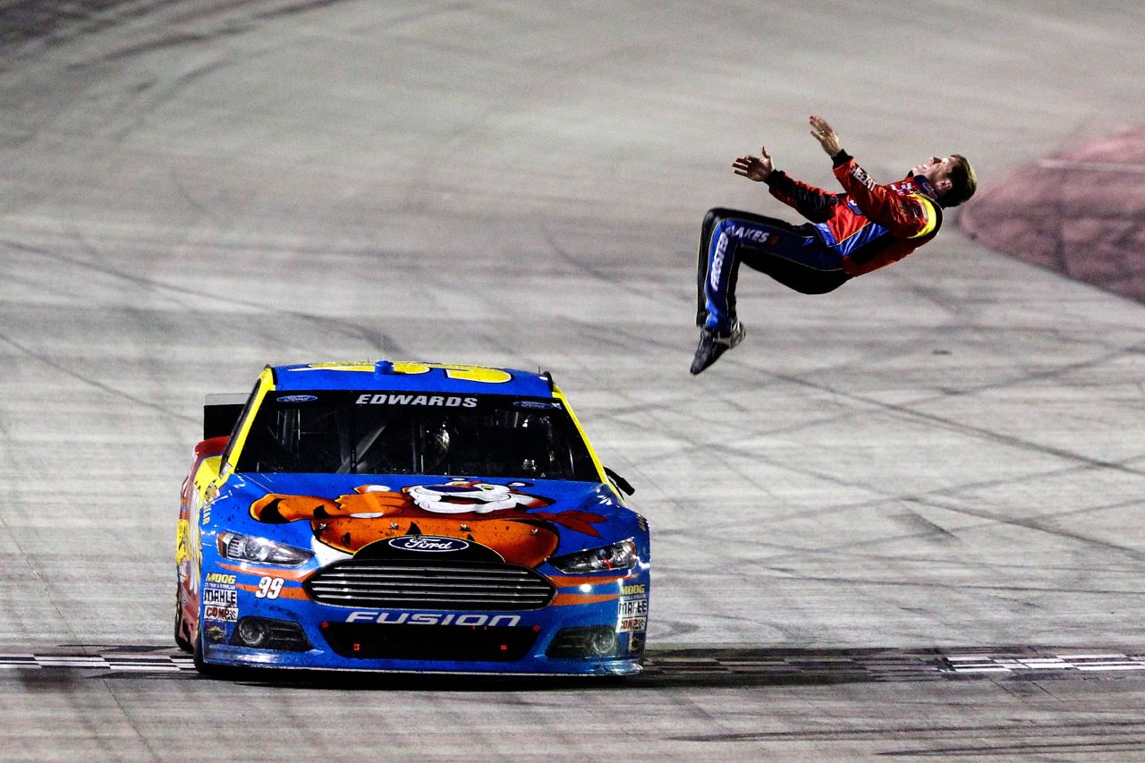 NASCAR driver Carl Edwards celebrates with a back flip after winning the Sprint Cup Series race at Bristol Motor Speedway on Sunday, March 16.