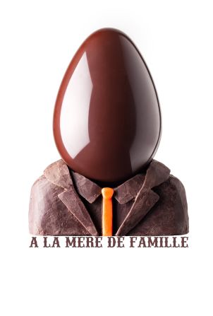 At <a href="index.php?page=&url=http%3A%2F%2Fwww.lameredefamille.com%2F" target="_blank" target="_blank">La Mere de Famille</a>, renowned chocolatier Julien Merceron dressed his egg in an elegant milk and dark chocolate suits. The "Tete d'Oeuf" comes with a colorful sheet of facial features to cut out and personalize the Easter treat. 