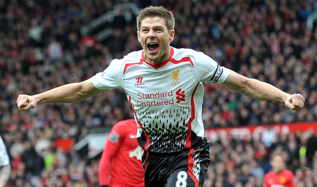 Liverpool midfielder Steven Gerrard celebrates after scoring his team's second goal against Manchester United on Sunday, March 16, in Manchester, England. <a href="http://www.cnn.com/2014/03/11/worldsport/gallery/what-a-shot-0311/index.html">See 32 amazing sports photos from last week.</a>