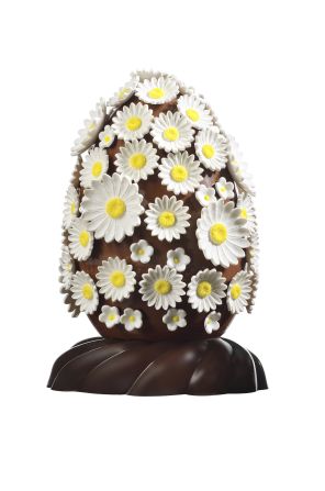 Chocolatier <a href="index.php?page=&url=http%3A%2F%2Fwww.christophe-roussel.fr%2F" target="_blank" target="_blank">Christophe Roussel</a> covered his chocolate egg with edible sugar daisies. You have to pick all of the flowers (she loves me, she loves me not...) to reach the grand cru Nyangbo 68% chocolate that lies beneath. 