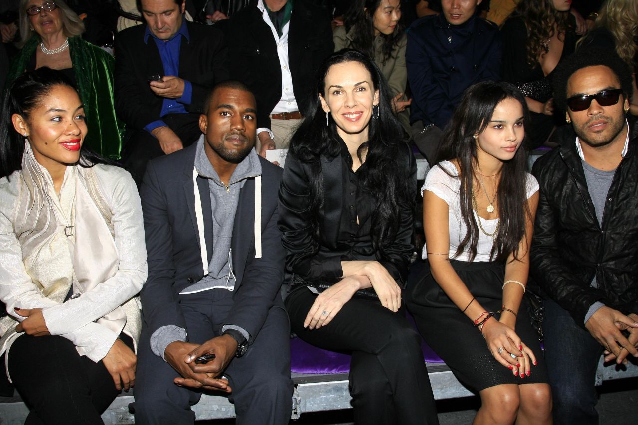Scott attends the Yves Saint Laurent Fashion Show in Paris with musicians Kanye West, second from left, and Lenny Kravitz, far right, in October 2006.