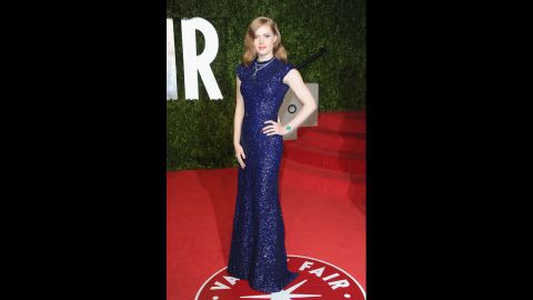 Actress Amy Adams arrives at the 2011 Vanity Fair Oscars party in a blue dress designed by Scott.