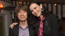 Singer Mick Jagger and fashion designer L'Wren Scott attend the launch celebration of the Banana Republic L'Wren Scott Collection hosted by Banana Republic, L'Wren Scott and Krista Smith at Chateau Marmont on November 19, 2013 in Los Angeles, California.