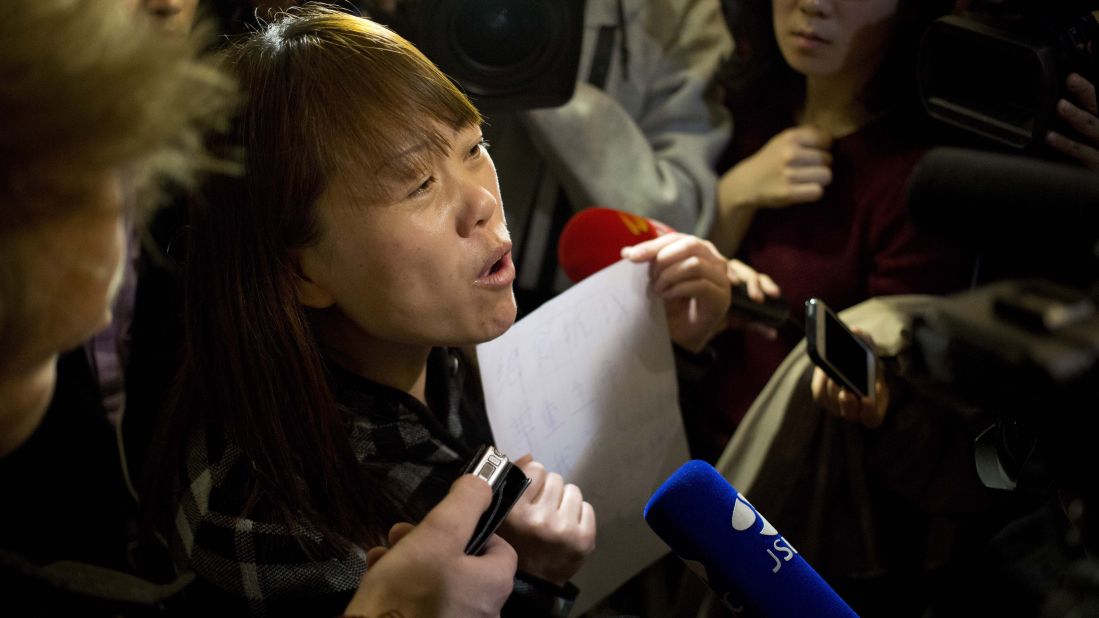 On March 18, 2014, a relative of a missing passenger tells reporters in Beijing about a hunger strike to protest authorities' handling of information about the missing jet.