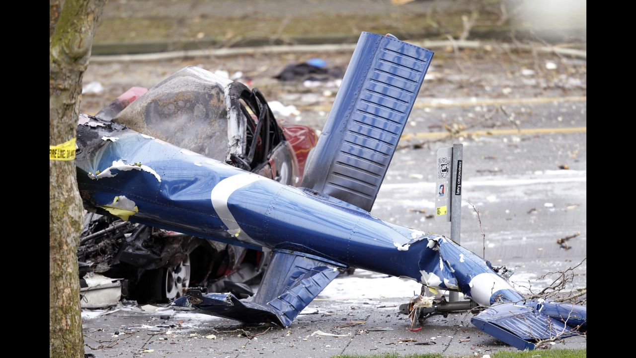 A piece of the wreckage sits on the ground. The crash occurred on Broad Street, the fire department spokesman said.
