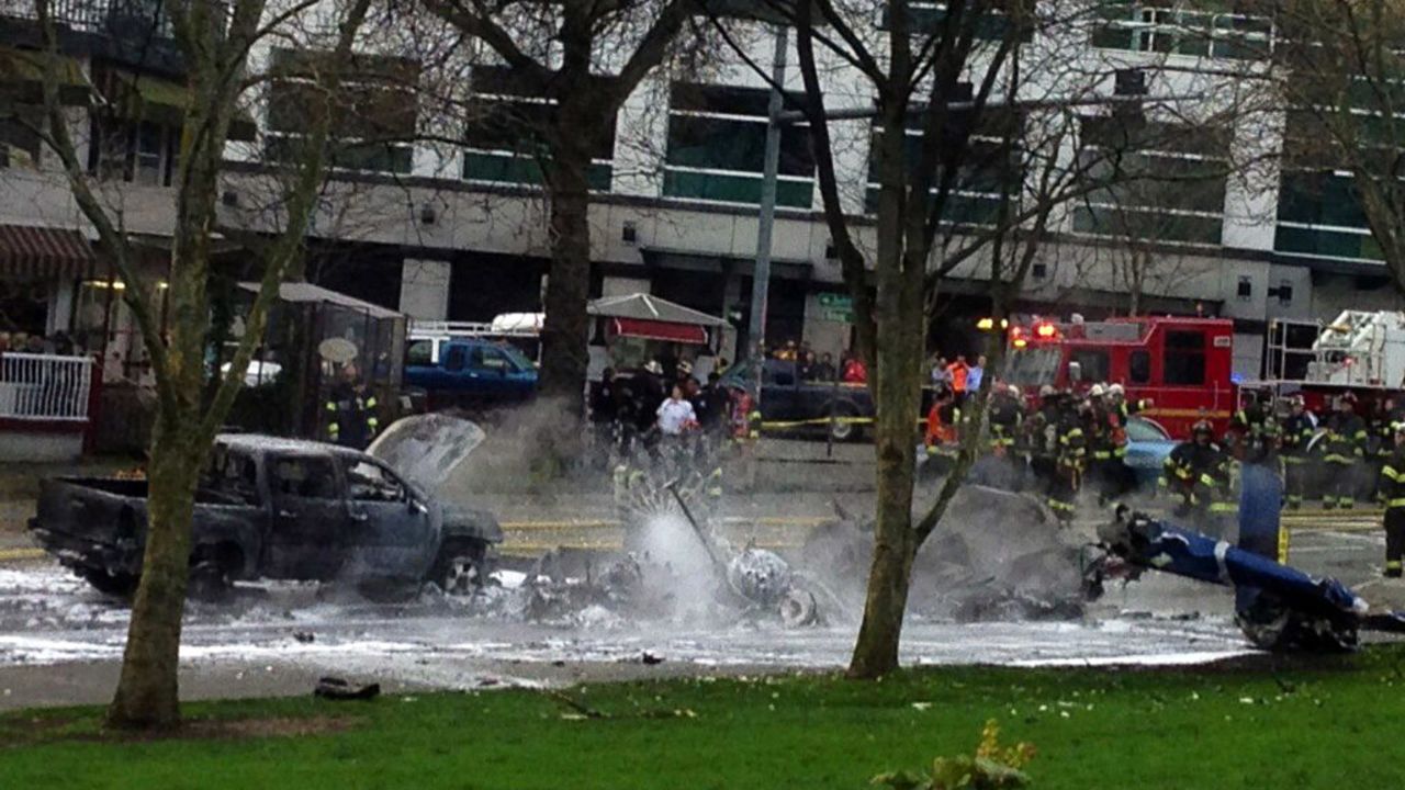 Emergency personnel respond to the scene of the crash.