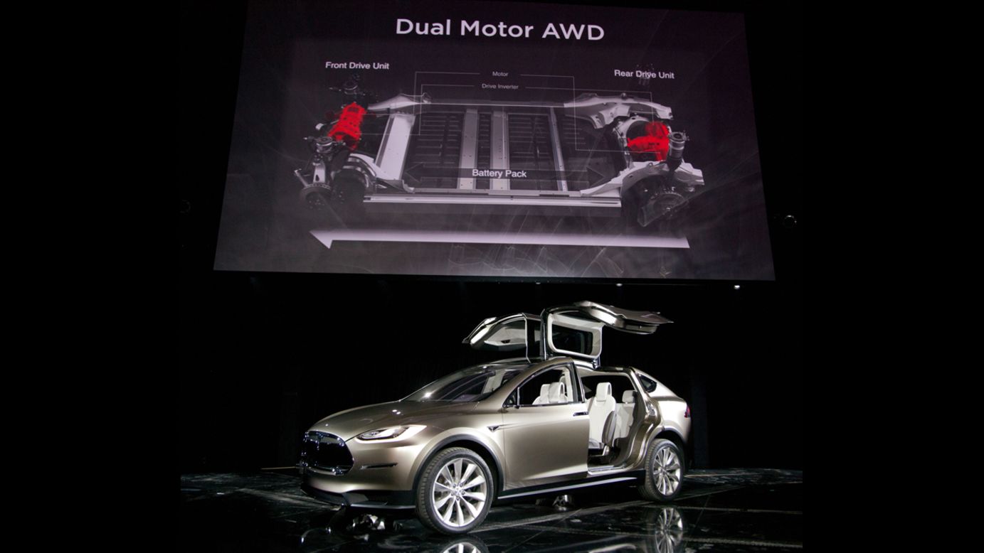 The Tesla Model X is unveiled at the company's design studio in Hawthorne, California, in 2012.  