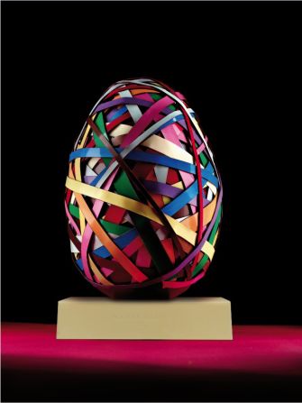 This may look like an orb made of rubber bands, but it is actually an edible Easter egg from French pastry chef <a href="index.php?page=&url=http%3A%2F%2Fwww.pierreherme.com%2F" target="_blank" target="_blank">Pierre Hermé</a>. It pays homage to the metal sculptures of Swiss artist <a href="index.php?page=&url=http%3A%2F%2Fwww.vonbartha.com%2Fartists%2Fbeat-zoderer%2F" target="_blank" target="_blank">Beat Zoderer</a> by layering multicolored chocolate strips around an 875-gram Brazilian dark chocolate egg. Hermé has made 15 of the eggs, which retail for $290.