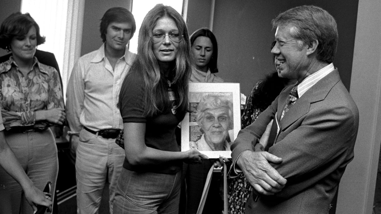 Steinem presents presidential nominee Jimmy Carter with a copy of Ms. magazine in 1976. The magazine featured Carter's mother on the cover.  