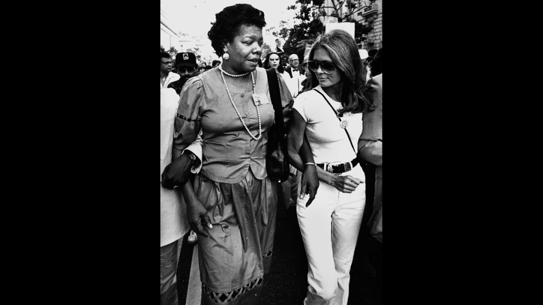 Steinem walks with writer Maya Angelou on their way to the March on Washington on August 27, 1983. The event commemorated the 20th anniversary of Martin Luther King Jr.'s "I Have a Dream" speech.