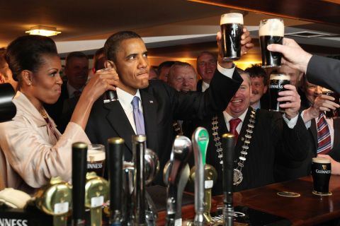 In May 2011, the Obamas visited Dublin. It was the first stop on a six-day trip to Europe. Here, the first couple enjoy glasses of Guinness at the President's ancestral home of Moneygall, Ireland, at the famous Ollie Hayes Pub. 