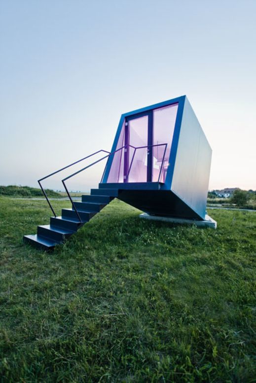 <em>Hypercubus, Austria</em><br /><br />This petite tilted house was developed to help encourage regional tourism, and can easily be transported wherever it's needed, based on demand. There is enough space to comfortably accommodate two people, and each room comes with its own sink and toilet. The architects, <a href="http://www.wg3.at/?lang=en" target="_blank" target="_blank">Studio WG3</a>, envisaged for several units to be brought together for big events, creating a whimsical village on an open plain. <br />