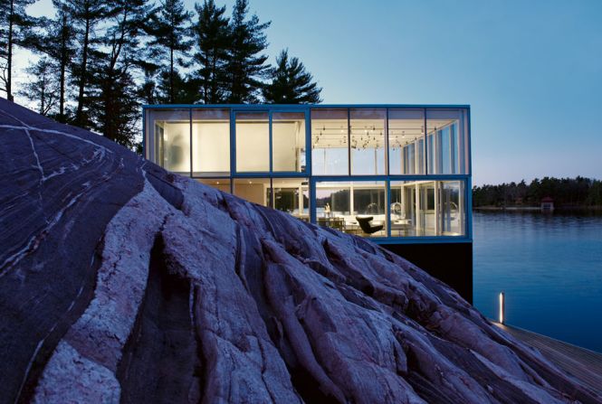 <em>With Held, Canad</em>a<br /><br />Perched on the edge of a lake, this photographer's studio is a glass marvel open to the landscape on all sides. One of the priorities for the architects, Toronto-based <a  target="_blank" target="_blank">studio GH3</a>, was to create a space bathed in light, a crucial demand for the client's professional needs. When the night falls, the house lights up as a lantern on the edge of the water.