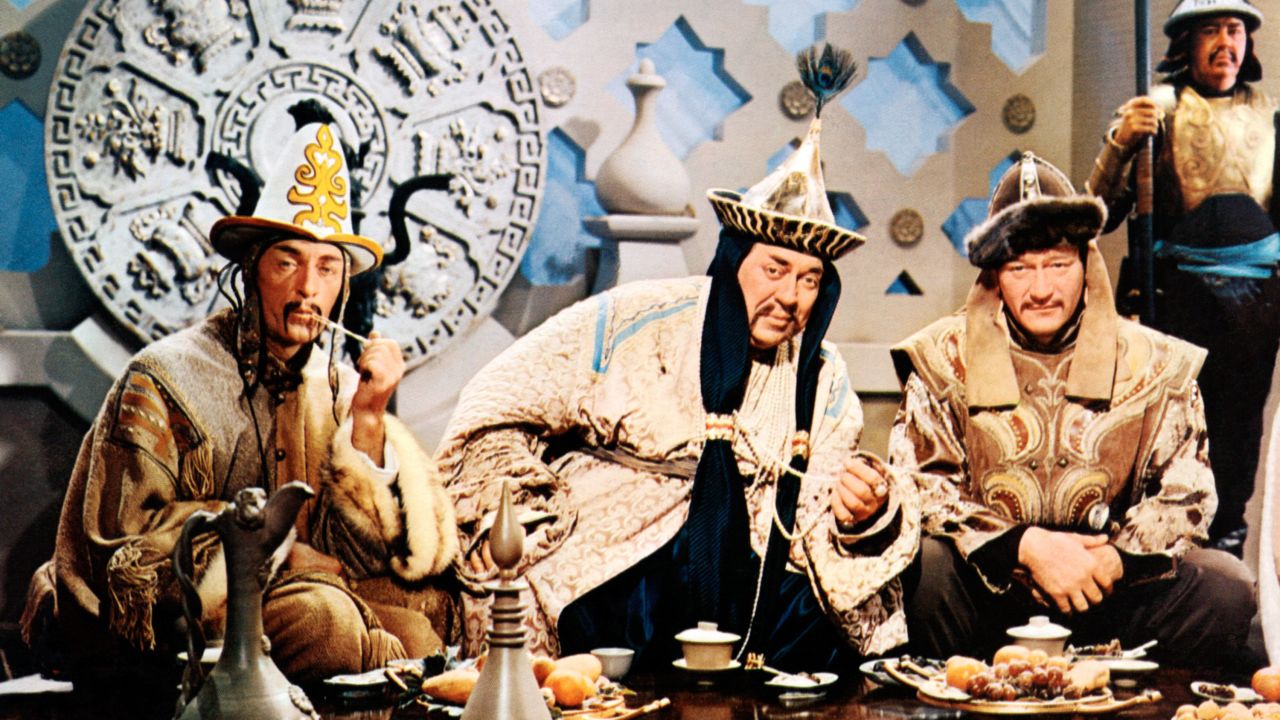 John Wayne, at right with John Hoyt and Thomas Gomez, played Genghis Khan in "The Conqueror" in 1956. 