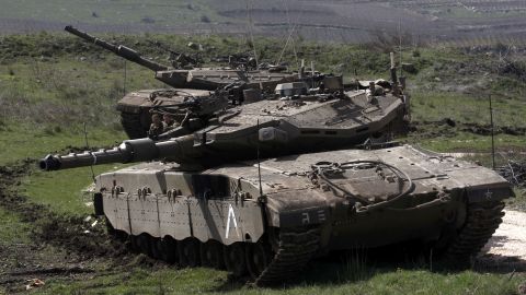 An Israeli tank stationed near Majdal Shams on the border with Syria, on March 19,2014 in Israeli-annexed Golan Heights.