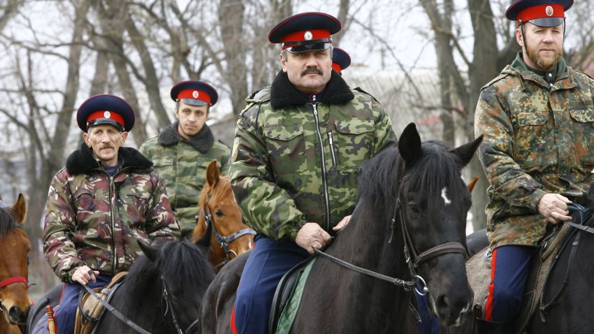 Mounted Cossacks patrol an area near Russian-Ukrainian border near the southern city of Rostov-on-Don, on March 19, 2014.