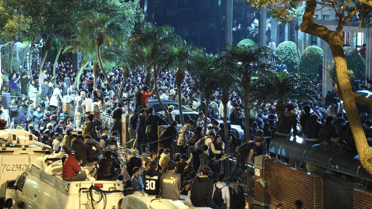 Protesters gather outside Taiwain's Legislative Yuan on March 19. They are demonstrating against a trade agreement with China.
