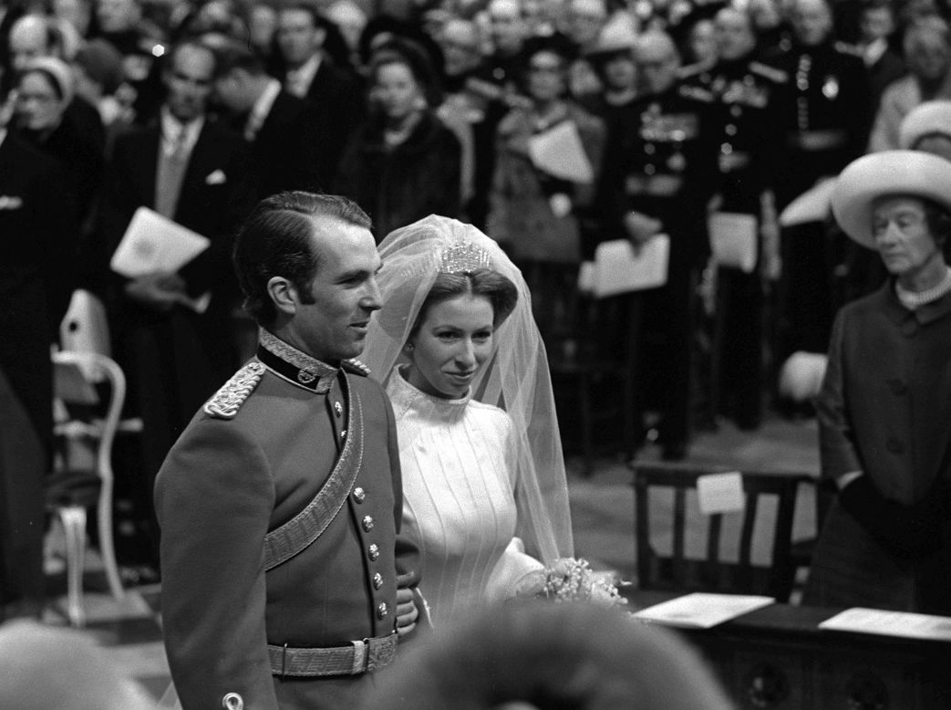 HRH Princess Anne and captain Mark Phillips stand together during their wedding service at Westminster Abbey in November 14, 1973.