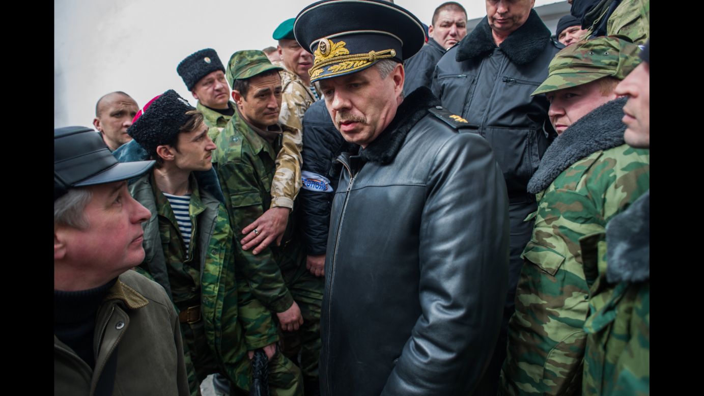 Alexander Vitko, chief of the Russian Black Sea Fleet, leaves the Ukrainian navy headquarters in Sevastopol after pro-Russian forces took it over on March 19.