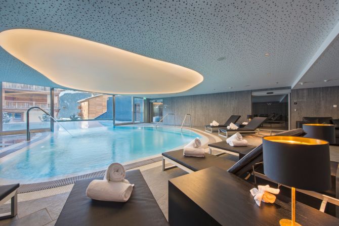 W Verbier's indoor-outdoor pool looks out onto the Swiss Alps.