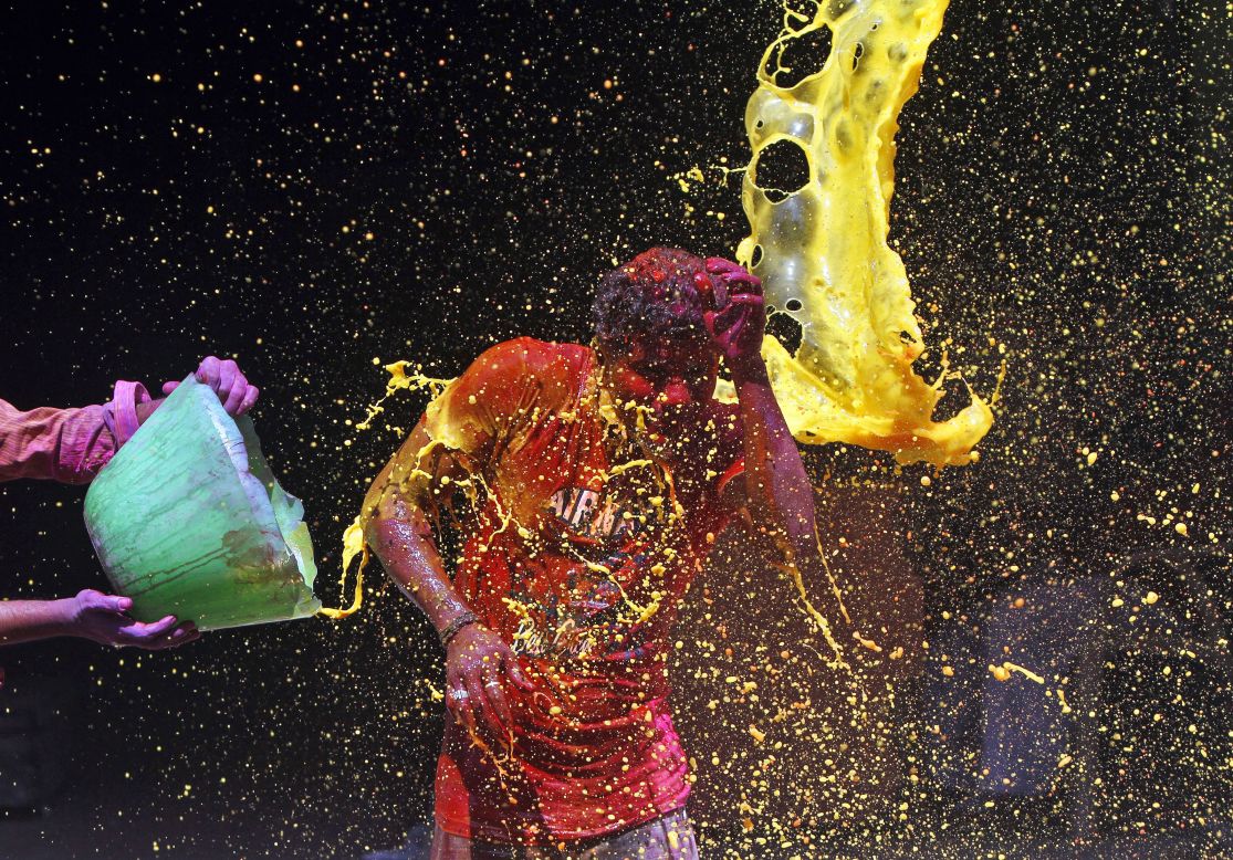 A man has colored water splashed onto him during <a href="http://www.cnn.com/2014/03/17/asia/gallery/holi-2014/index.html">Holi celebrations</a> in Chennai, India, on Monday, March 17. The Holi festival of colors is a Hindu celebration of the arrival of spring.