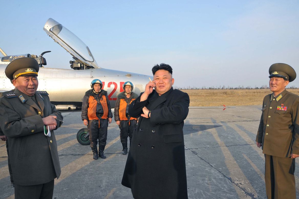 In this photo released by the state-run Korean Central News Agency, North Korean leader Kim Jong Un smokes a cigarette as he attends a military flight exercise in Pyongyang, North Korea, on Monday, March 17.