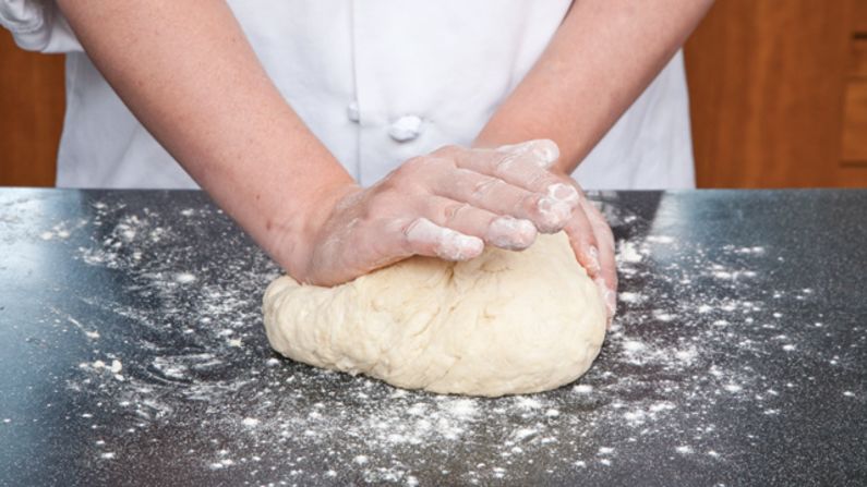 Knead the dough briefly.
