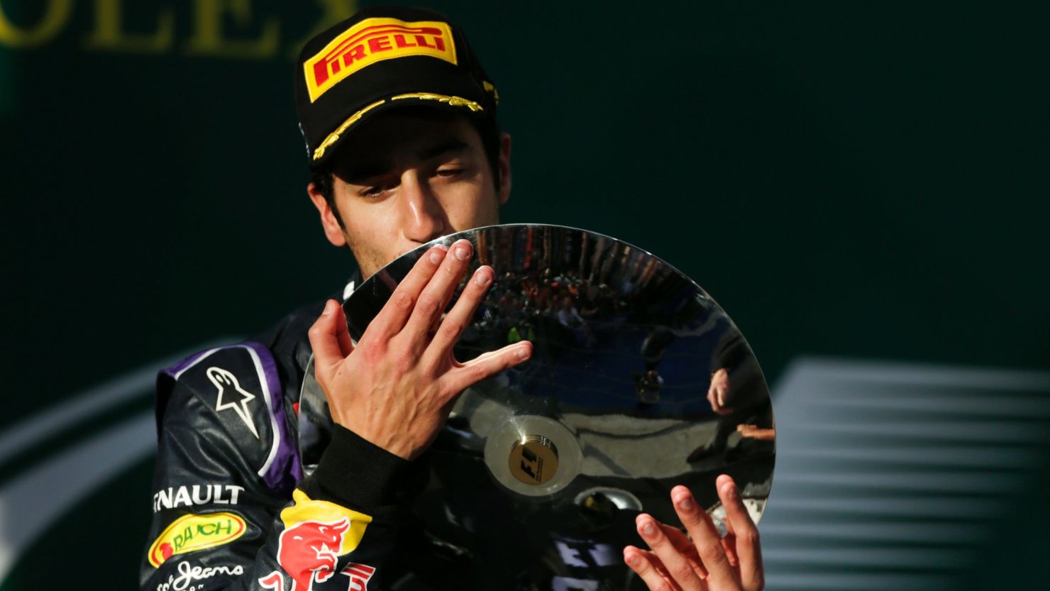 Australian Daniel Ricciardo briefly celebrated on the podium at his home grand prix, before learning he had been disqualified.