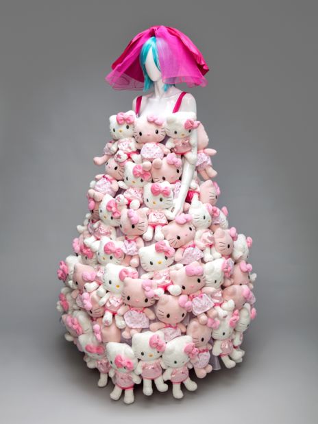 The exhibit features a dress made entirely of Hello Kitty dolls. Hello Kitty celebrates its 40th anniversary in 2014. 