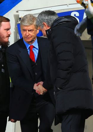 Arsenal boss Arsene Wenger (left) and Jose Mourniho shared a frosty handshake before kick-off at Stamford Bridge. It proved to be a miserable day for the Gunners boss on the occasion of his 1,000 game in charge at the club.   