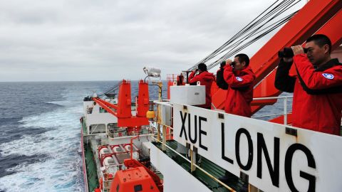 Crew members on search duty on board the Chinese icebreaker Xuelong on March 23, 2014.