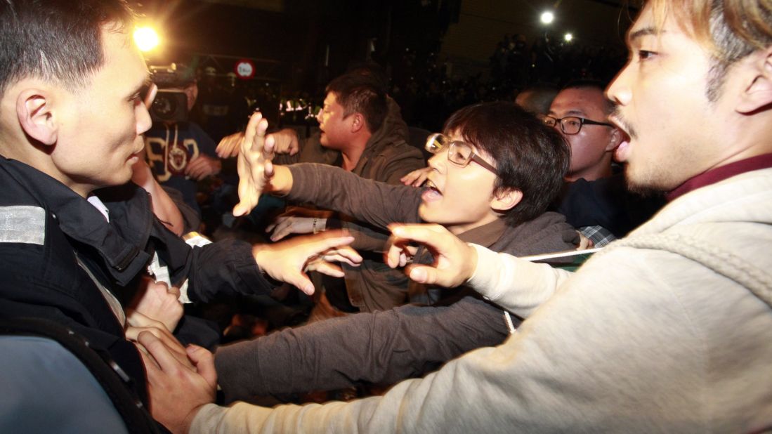 Student protesters clash with police in Taipei on March 24.