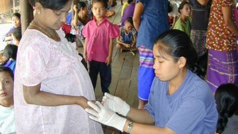 Malaria testing at Mae La refugee camp, Northwest Thailand. - (Courtesy Shoklo Malaria Research Unit.)