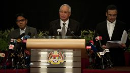 Malaysian Prime Minister Najib Razak, center, delivers a statement on the missing Malaysia Airlines Flight 370 in Kuala Lumpur, Malaysia, on Monday, March 24.