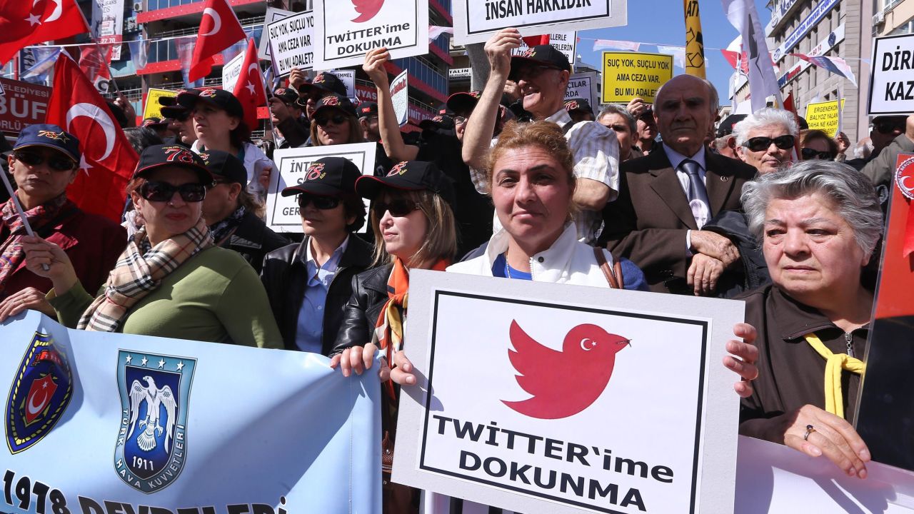 Protesters in Ankara hold "Do not touch my Twitter" placards during a demonstration last month against Turkey's Twitter ban.