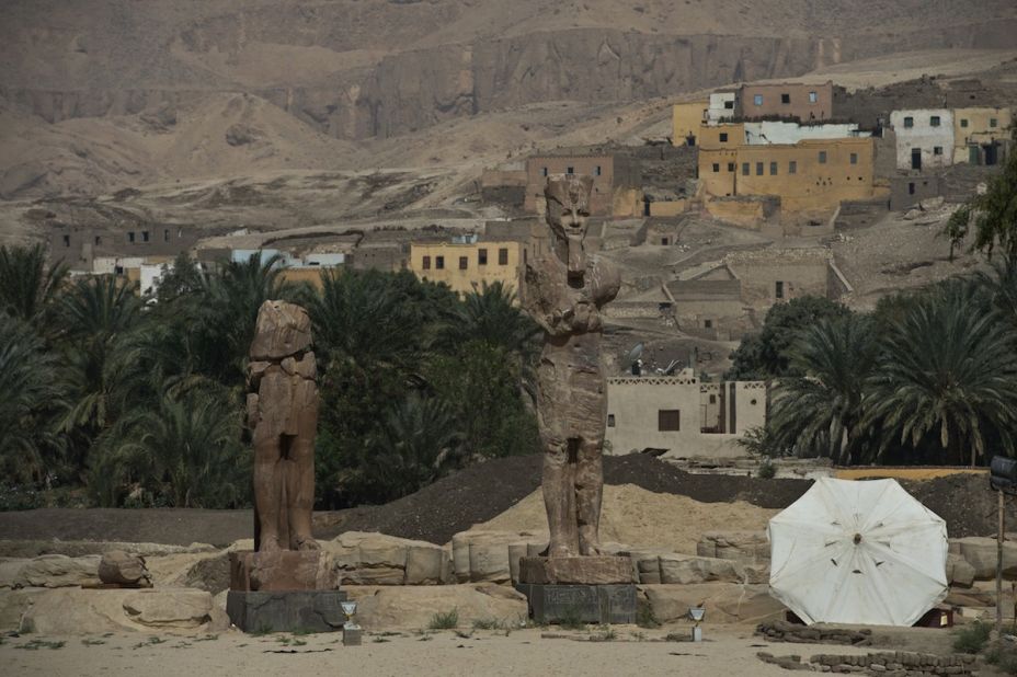 Two colossal statues of Pharaoh Amenhotep III were unveiled by archaeologists Sunday -- after being moved to their original sites and restored -- in the funerary temple of the king, on the west bank of the Nile in Luxor, Egypt. 