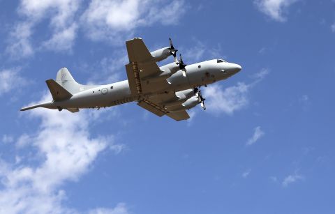 A Royal Australian Air Force AP-3C Orion takes off from the Pearce air base in Perth, Australia, to join the search for Malaysia Airlines Flight 370 on Sunday, March 23.