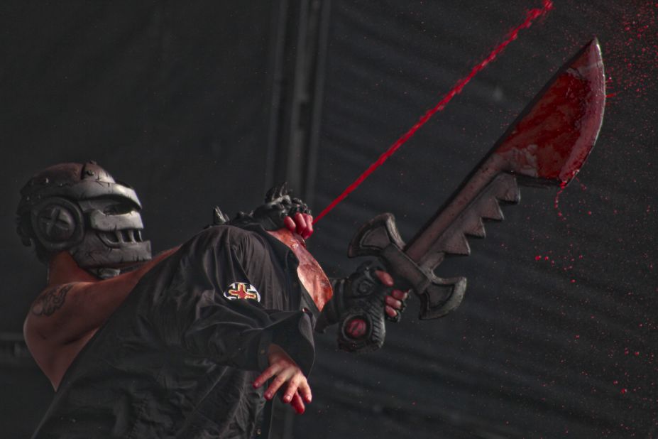 A simulated decapitation takes place on stage.