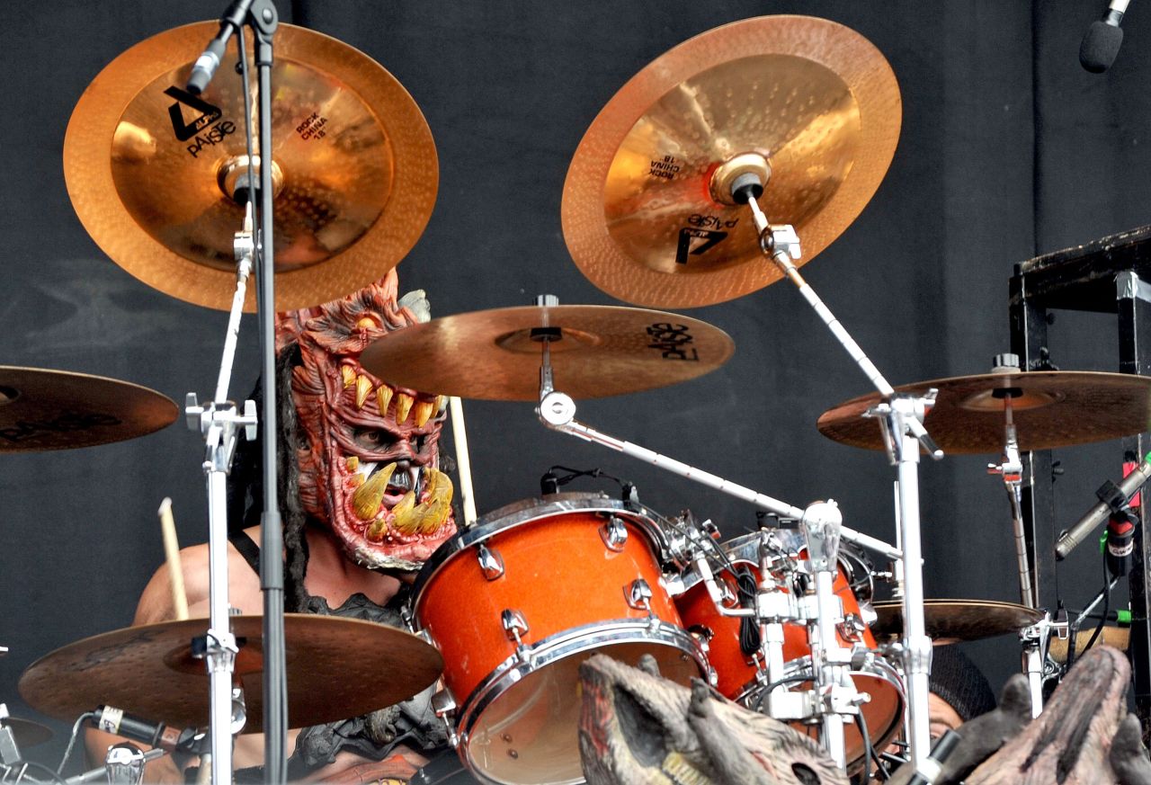 Drummer Brad Roberts performs as the dog-headed Jizmak Da Gusha.