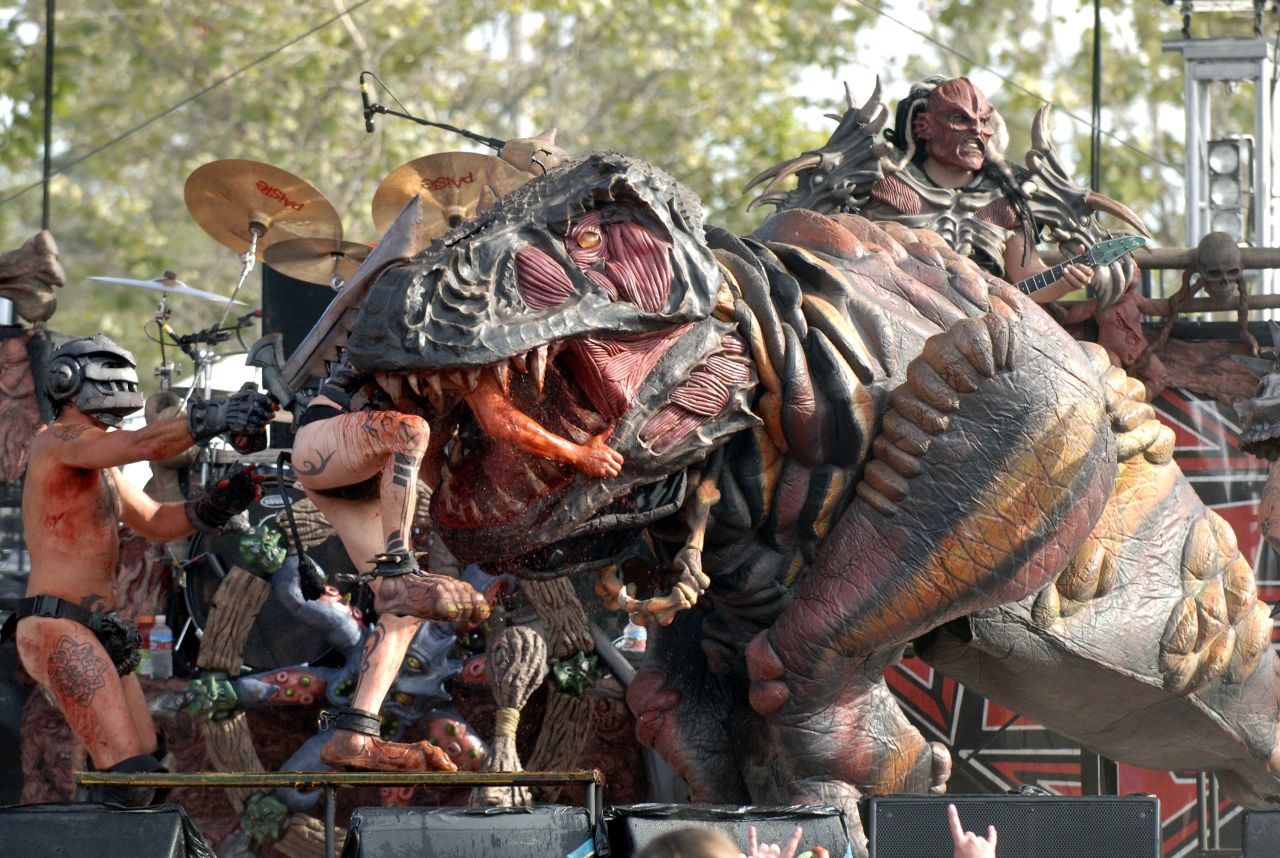 The band's resident dinosaur, Gor-Gor, wreaks havoc on stage.