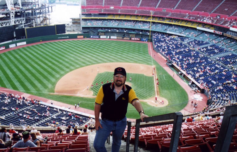 <strong>Cinergy Field (2002):</strong> Ondrovic poses for a photo in the stands at the home of baseball's first professional franchise, the Cincinnati Reds. The team played there from 1970 to 2002, when it was demolished. The team now plays at Great American Ballpark.