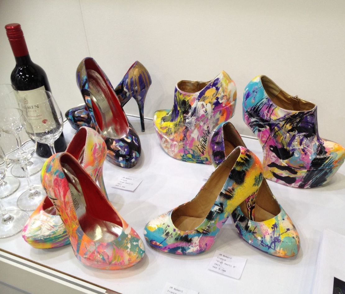 Painted high heel shoes by France artist JM Robert at the Affordable Art Hong Kong fair. The pair front right sold for HK$4,500 ($580).