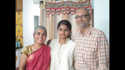 Chandrika Sharma, left, was on Flight 370; her daughter Meghna and husband K.S. Narendran wait patiently, trying to manage their anxiety and longing for her return.